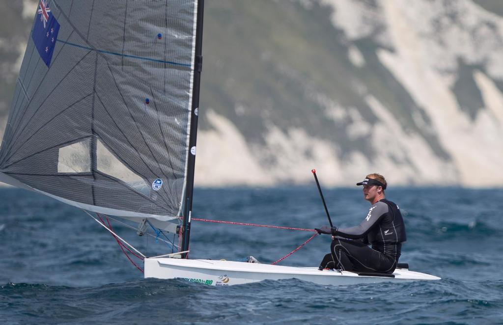 Josh Junior, NZL, Men’s One Person Dinghy Heavy (Finn) on day two of the ISAF Sailing World Cup Weymouth & Portland. © onEdition http://www.onEdition.com