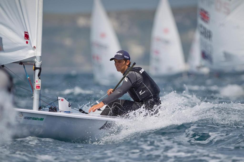 Thomas Saunders, NZL, Men’s One Person Dinghy (Laser) on day two of the ISAF Sailing World Cup Weymouth & Portland. © onEdition http://www.onEdition.com