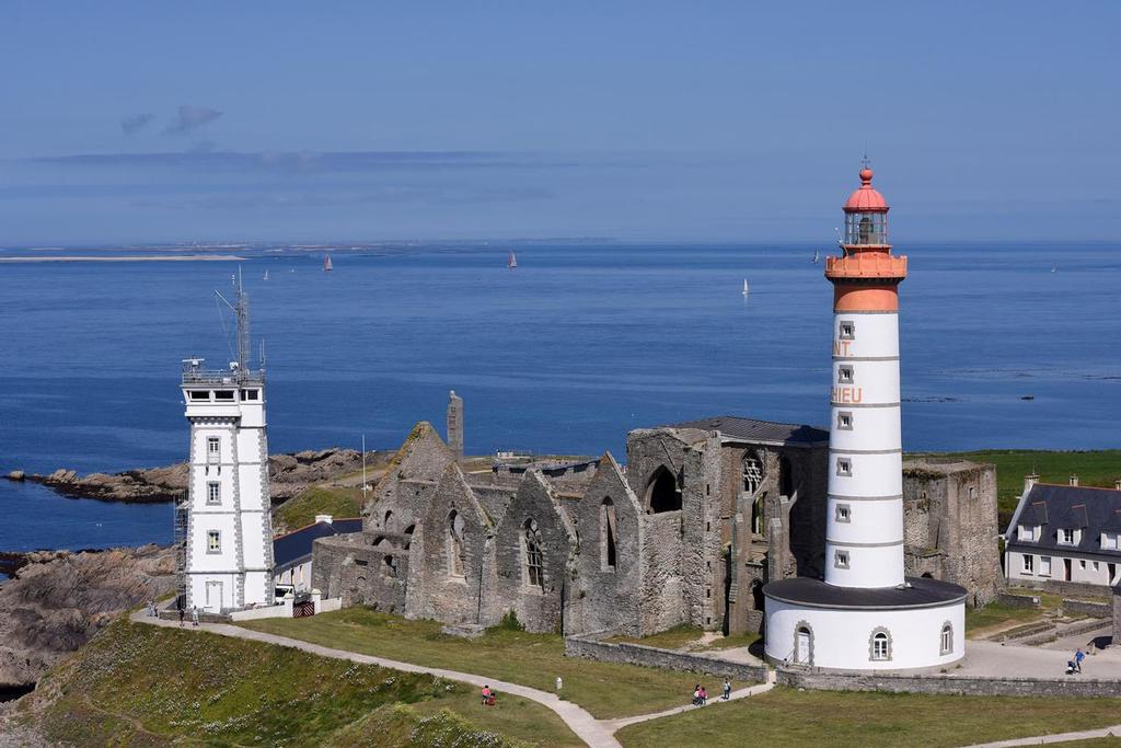 June 17 2015 Volvo Ocean Race Leg 9 Lorient to Gothenburg via The Hague. <br />
Boats close to Ushant NW Brittany France by the Kermorvan lighthouse<br />
 © Rick Tomlinson/Volvo Ocean Race http://www.volvooceanrace.com