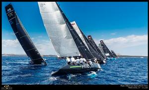 Team Aqua ducks the fleet at the start of race one - 2015 Audi RC44 Porto Cervo Cup photo copyright  Martinez Studio / RC44 Class taken at  and featuring the  class
