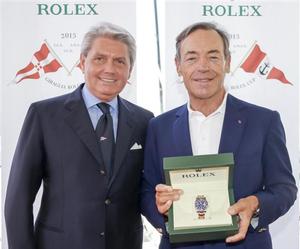 Gian Riccardo Marini, Rolex SA and Sir Lindsay Owen-Jones, owner of Magic Carpet Cubed, GBR, overall winner - 2015 Giraglia Rolex Cup photo copyright  Rolex / Carlo Borlenghi http://www.carloborlenghi.net taken at  and featuring the  class