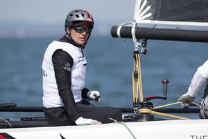 Ernesto Bertarelli at the helm of Alinghi - 2015 Bullitt GC32 Racing Tour – Cowes Cup photo copyright Sander van der Borch / Bullitt GC32 Racing Tour taken at  and featuring the  class