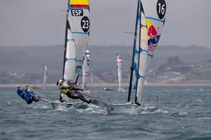 Tamara Echegoyen and Berta Betanzos Moro, ESP, Alexandra Maloney and Molly Meech, NZL, Women’s Skiff (49erFX) on day four - 2015 ISAF Sailing WC Weymouth and Portland photo copyright onEdition http://www.onEdition.com taken at  and featuring the  class