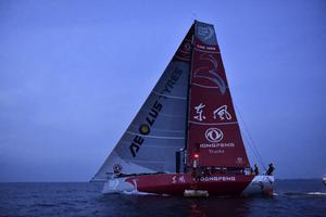 June 11,2015. Dongfeng Race Team arrives in seventh position on Leg 8 to Lorient photo copyright Volvo Ocean Race http://www.volvooceanrace.com taken at  and featuring the  class