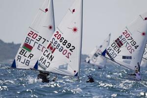 The Women's One Person Dinghy (Laser Radial) fleet on day one - ISAF Sailing World Cup Weymouth and Portland photo copyright onEdition http://www.onEdition.com taken at  and featuring the  class
