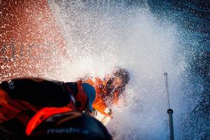 Nick Dana breaks a wave on the bow of Alvimedica for a windy downwind sail change - See more at: http://sailcouture.com/meet-nick-dana-of-team-alvimedica-us-entry-in-the-volvo-ocean-race-2/#sthash.niSmKUdT.dpuf - Volvo Ocean Race 2015 photo copyright  Amory Ross / Team Alvimedica taken at  and featuring the  class