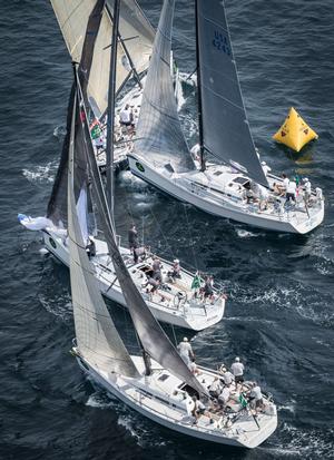 Close racing has been a hallmark of the Swan 42 since its inception in 2007. Mutiny (top left), Blazer (top right) and Apparition (bottom) are three of the four boats vying for the New York Yacht Club's berth in the 2015 Rolex Invitational Cup photo copyright  Rolex/Daniel Forster http://www.regattanews.com taken at  and featuring the  class