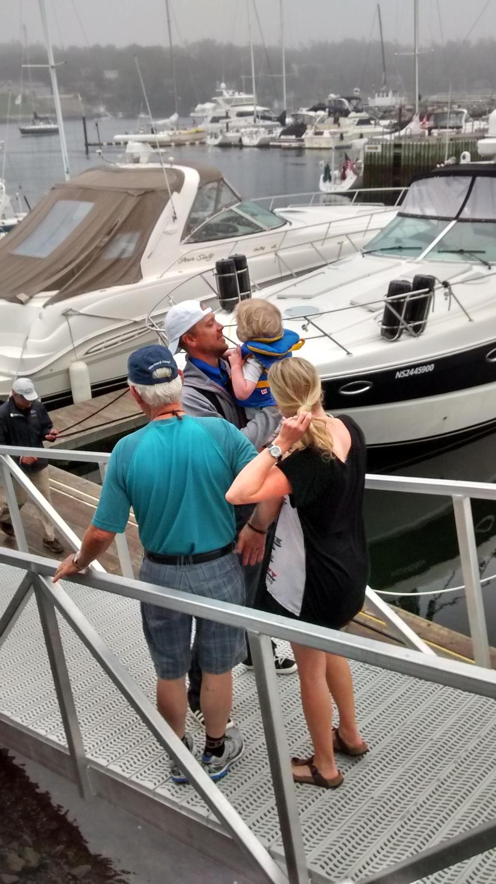 ``Illicit`` crew member Luke Chaulk is welcomed home to Halifax by his family. photo copyright David Yetman taken at  and featuring the  class