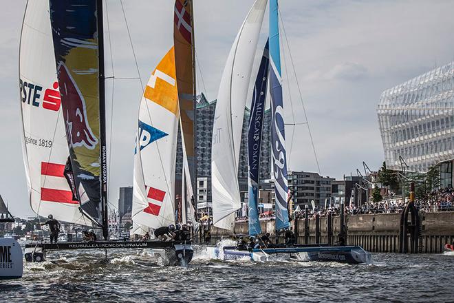 SAP Extreme Sailing Team, The Wave, Muscat and Red Bull Sailing Team race downwind © Jesus Renedo / OC Sport