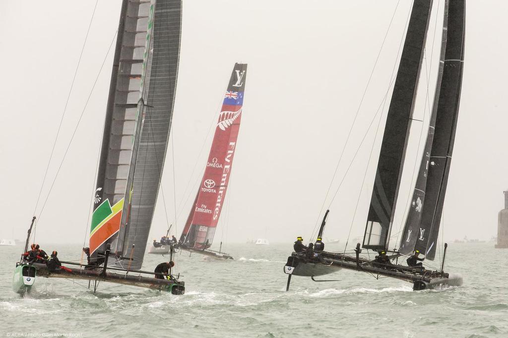 Emirate Team NZ leads in the murk of the English summer Practice Day 35th America's Cup, Louis Vuitton America's Cup World Series Portsmouth 2015 © ACEA /Gilles Martin-Raget