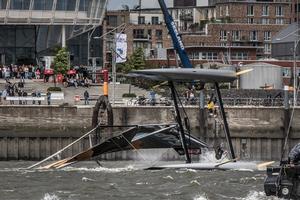SAP Extreme Sailing Team capsize in Hamburg - 2015 Extreme Sailing Series photo copyright  Jesus Renedo http://www.sailingstock.com taken at  and featuring the  class