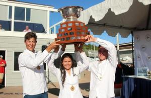 Hoisting the Governor's Cup by (L to R) Angus Williams, Tara Blanc-Ramos, Harry Price - 49th Annual Governor's Cup International Junior Match Racing Championship photo copyright Longpre Photos taken at  and featuring the  class