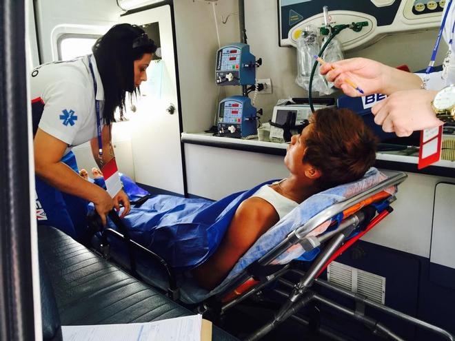 RS:X Windsurfer, Wonwoo Cho (KOR) being loaded into an ambulance prior to being hospitalised © SW