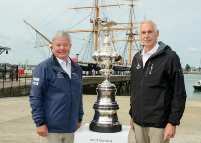 Sir Keith Mills, co-founder of Team Origin events and chairman of the World Series Portsmouth, left, and Dr Harvey Schiller, commercial commissioner of the America's Cup, with the America's Cup trophy - America's Cup © Allan Hutchings
