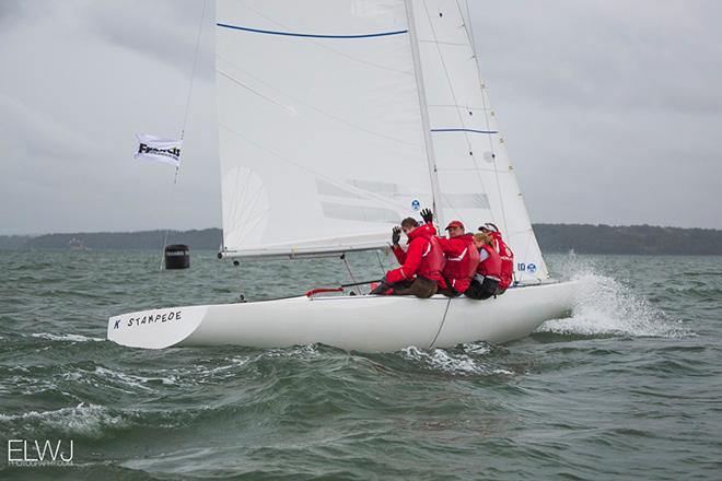 Mark Thornburrow's team from the Royal Hong Kong Yacht Club had a day of mixed fortunes, but a win in the final race helped them retain their overall lead for a second day. © Emma Louise Wyn Jones Photography