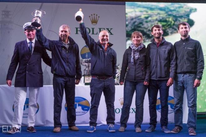RORC Commodore, Michael Boyd presents the Iolaire Cup to IRC 4 winner, Gerard Quenot's JPK 10.10, Alkaid 111 - Nautistock - 2015 Rolex Fastnet Race ©  ELWJ Photography
