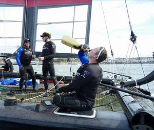 Emirates Team NZ crew taste the sweet  champagne at the end of a successful regatta in Gothenburg. photo copyright Hamish Hooper/Emirates Team NZ http://www.etnzblog.com taken at  and featuring the  class