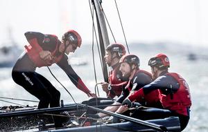 Land Rover BAR's Giles Scott in action on-board - 2015 America's Cup World Series photo copyright Lloyd Images taken at  and featuring the  class