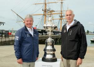 Sir Keith Mills, co-founder of Team Origin events and chairman of the World Series Portsmouth, left, and Dr Harvey Schiller, commercial commissioner of the America's Cup, with the America's Cup trophy - America's Cup photo copyright Allan Hutchings taken at  and featuring the  class