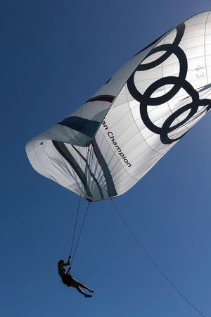 Antonia Fong swings from Wild Rose spinnaker pre-race - 2015 Airlie Beach Race Week photo copyright Andrea Francolini / ABRW taken at  and featuring the  class