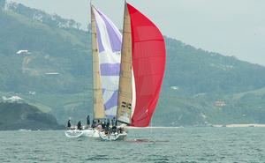 Coastal scenery: Racing off the coast at Coffs Harbour – the venue for the start of Southport Yacht Club’s Coffs to Paradise race on January 7, 2016 photo copyright Bronwen Hemmings taken at  and featuring the  class