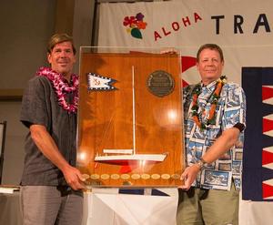 Keith Kilpatrick (left) won the Don Vaughn Memorial Trophy as Outstanding Crewman on Rio 100, presented by TPYC Vice Commodore Bo Wheeler photo copyright  Sharon Green taken at  and featuring the  class