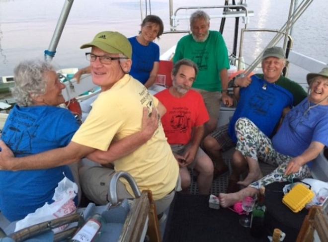 The 2015 PCCR T-shirts modelled by Dawn, Ian, Donna, Bob, Frank, Blake, and JJ aboard Dulcinea II. - 2015 Peterson Cup Cruising Rally © Bluewater Cruising Association