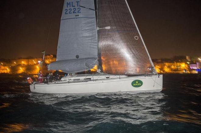 Artie (MLT) crossing the finish line in Marsamxett Harbour to become winner of the Rolex Middle Sea Race 2014 - 2015 Rolex Middle Sea Race ©  Rolex/ Kurt Arrigo http://www.regattanews.com