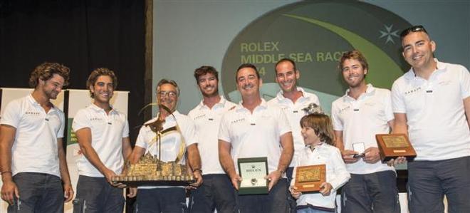 Lee Satariano and crew of Artie (MLT) receiving the Rolex Middle Sea Race trophy and Rolex timepiece - 2015 Rolex Middle Sea Race ©  Rolex/ Kurt Arrigo http://www.regattanews.com
