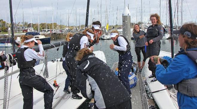 Lauren and Clare spraying the MAXX team with Champagne - 2015 Australian Women’s Match Racing Championship © Stephen Collopy