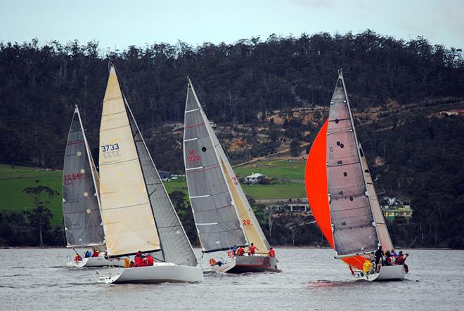 The course for the Cock of the Huon takes the fleet past picturesque hills surrounding the Huon RIver.  © Peter Campbell