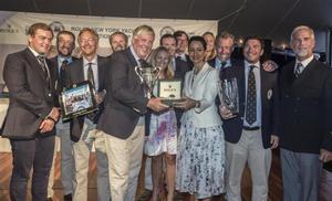 Overall Rolex NYYC Invit. Cup Winner, Royal Thames Yacht Club accepting the Rolex timepiece from Mounia Mechbal, Vice President of Communications, Rolex Watch USA, with New York Yacht Club Commodore Rives Potts (far R). - Rolex New York Yacht Club Invitational Cup 2015 photo copyright  Rolex/Daniel Forster http://www.regattanews.com taken at  and featuring the  class