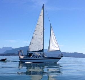 Alia motor-sailing on a glassy Salish Sea, headed for ‘Isla des Acorn-Hornos’. - 2015 Peterson Cup Cruising Rally photo copyright Bluewater Cruising Association taken at  and featuring the  class