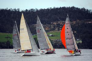 The course for the Cock of the Huon takes the fleet past picturesque hills surrounding the Huon RIver. photo copyright Peter Campbell taken at  and featuring the  class