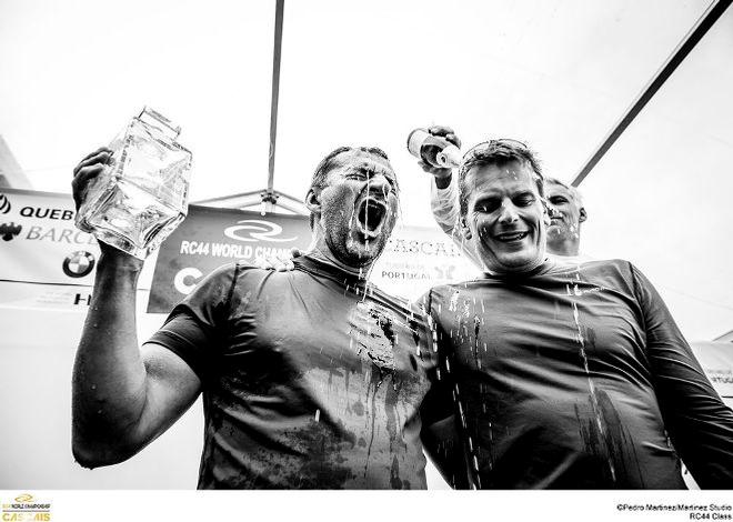 Vladimir Prosikhin and tactician Dean Barker drenched in celebratory champagne - RC44 World Championship Cascais 2015 © Martinez Studio
