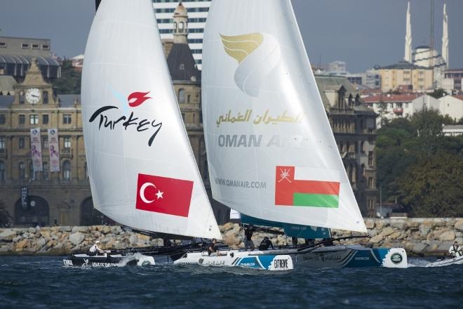 Oman Air Team skippered by Stevie Morrison (GBR) with crew Nic Asher (GBR), Ed Powys (GBR), Ted Hackney (AUS) and bowman Ali Al Balushi (OMA) and Team Turx and skippered by Edherm Divanna (TUR) and Mitch Booth (AUS) with crew Selim Divana (TUR), Diogo Cayalla (POR) Stewart Dobson (GBR) and bowman Pedro Andrade (POR) © Mark Lloyd http://www.lloyd-images.com