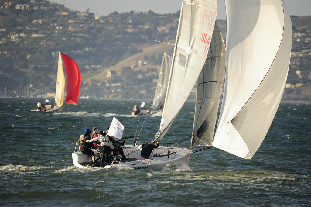 The smallest of the 'big boats``, the Melges 24 fleet always provides some of the best action. Here's Bones, looking both classic and classy with the entire inventory flying. photo copyright Chuck Lantz http://www.ChuckLantz.com taken at  and featuring the  class