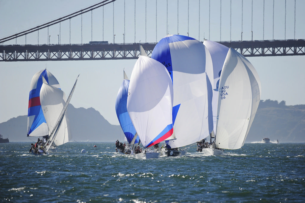A small white ball in the water on the left, and a large white ball of spinnakers on the right. It took those boats five tries to get the shape just right for this shot. Honest. photo copyright Chuck Lantz http://www.ChuckLantz.com taken at  and featuring the  class
