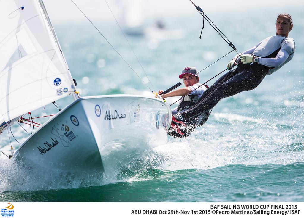 Local sailing school and olympic sailors together sailing optimist. 2015 ISAF Sailing World Cup Final, Abu Dhabi, United Arab Emirate. Eight Olympic sailing events are being contested along with open kiteboarding from 29th October to November 1st, 2015. Prize money will be awarded to the top three overall finishers in each of the events for a total prize purse of US$220,000. The Abu Dhabi Sailing and Yacht Club is the host of the ISAF Sailing World Cup Final, located on the main island of the ci photo copyright  Sailing Energy taken at  and featuring the  class