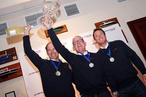 2015 World Champions, from left to right: Bill Hardesty, John Kilroy Jr. and Jeff Reynolds photo copyright 2015 JOY | IM20CA taken at  and featuring the  class