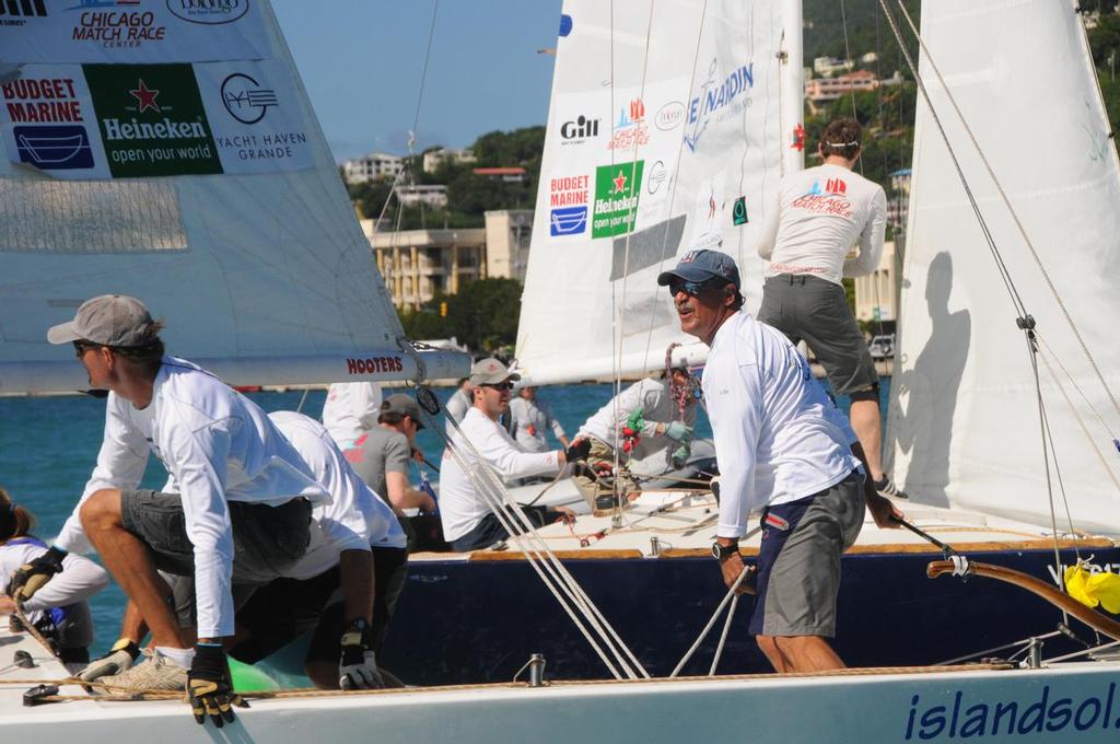 The USVI’s Peter Holmberg, right (facing) and his team in close competition during the 2013 CAMR. Credit: Dean Barnes © Dean Barnes