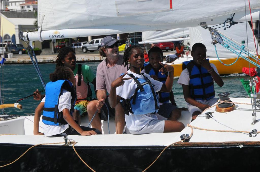 The USA’s Dave Perry (second from left/purple shirt) participates in the short Youth Regatta, as a part of the CAMR. Credit: Dean Barnes © Dean Barnes