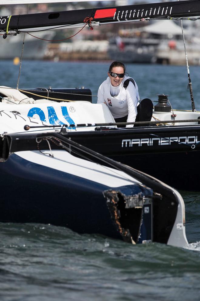 33 South Racing's skipper Katie Spithill checks out the damage after her collision with Lino Sonego Team Italia - 2015 Extreme Sailing Series © Lloyd Images