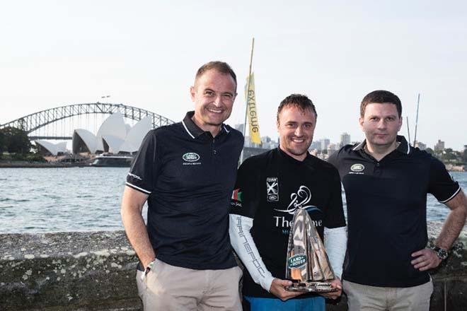 Matthew Wiesner (left), Managing Director, Land Rover Australia and Dimitry Kolchanov Regional Director Overseas for Jaguar Land Rover (right) with Leight McMillan, Skipper of The Wave, Muscat and the winner of the Land Rover Above and Beyond Award. © Extreme Sailing Series http://www.extremesailingseries.com