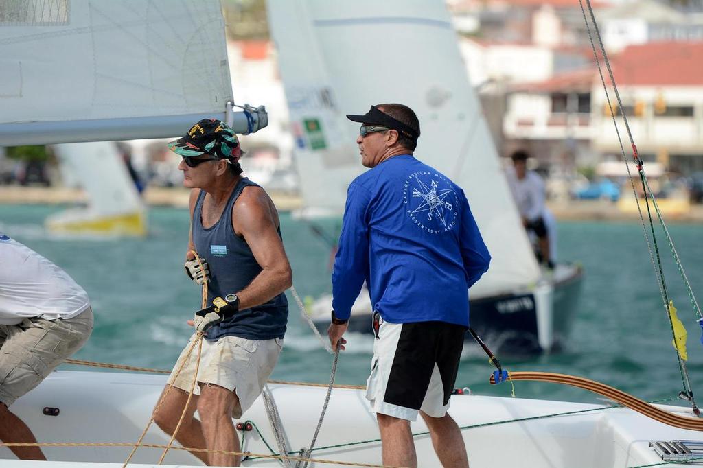 The USVI’s Peter Holmberg (far right) and crew Maurice Kurg in the hunt. © Dean Barnes