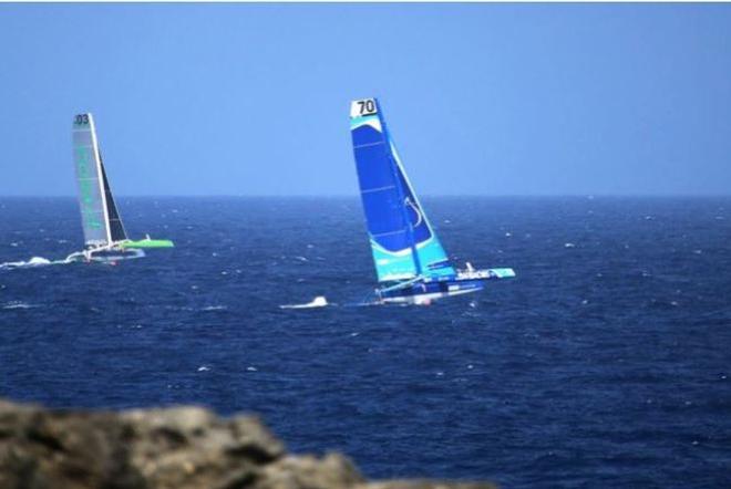 Ms. Barbados begins to climb inside Phaedo as they head out into the Atlantic swell of North Point © Team Concise