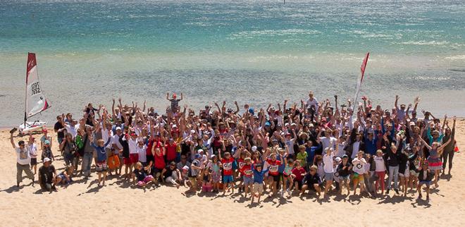 All the competitors, volunteers and officials adorn Safety Beach for the group shot. - 2015 Bic O'pen World Cup ©  Alex McKinnon Photography http://www.alexmckinnonphotography.com