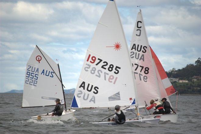 Trio of dinghy classes that contested the Crown Series, from left, an Optimist, a Laser Radial and an International Cadet © Max Ellis