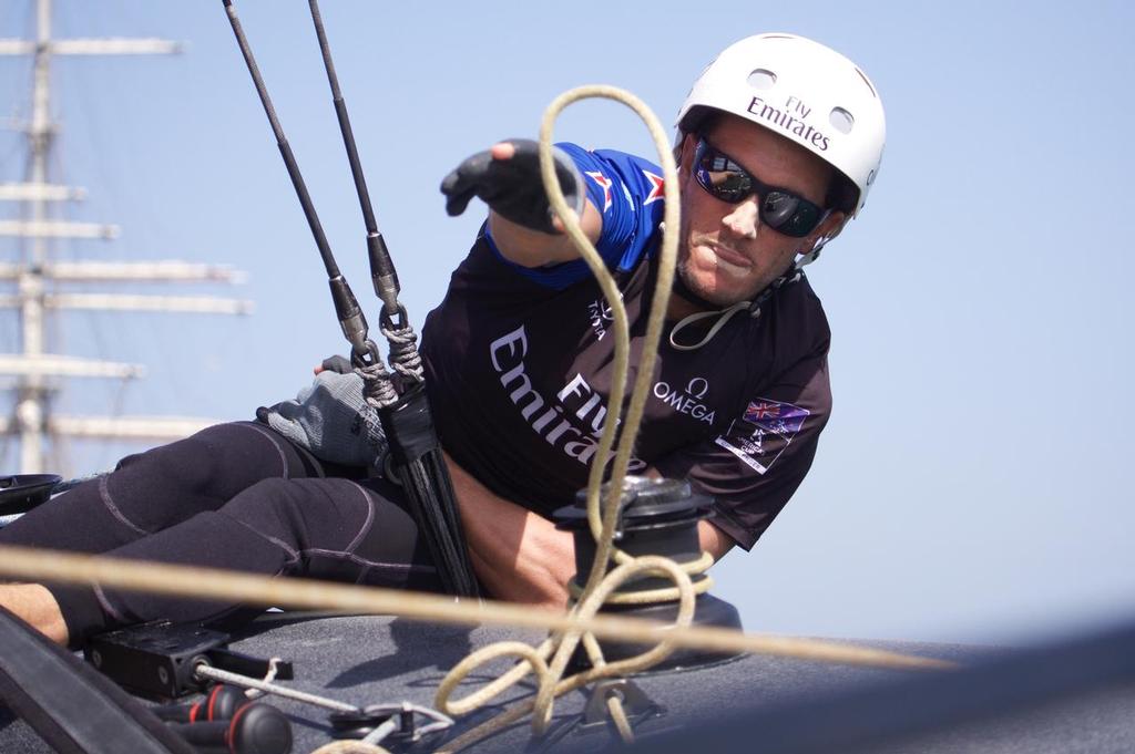 28/2/16 Blair Tuke clears the lines onboard Emirates Team New Zealand on race day two of Louis Vuitton America's Cup World Series Oman photo copyright Hamish Hooper/Emirates Team NZ http://www.etnzblog.com taken at  and featuring the  class