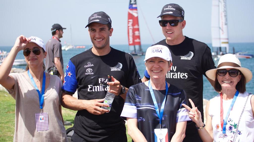 28/2/16 Helmsman Peter Burling & trimmer Blair Tuke pose for a photo with fans on race day two of Louis Vuitton America's Cup World Series Oman © Hamish Hooper/Emirates Team NZ http://www.etnzblog.com
